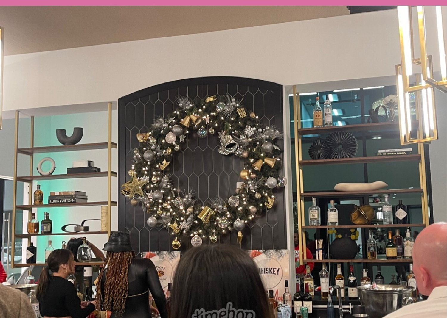 Large ornament wreath over a bar